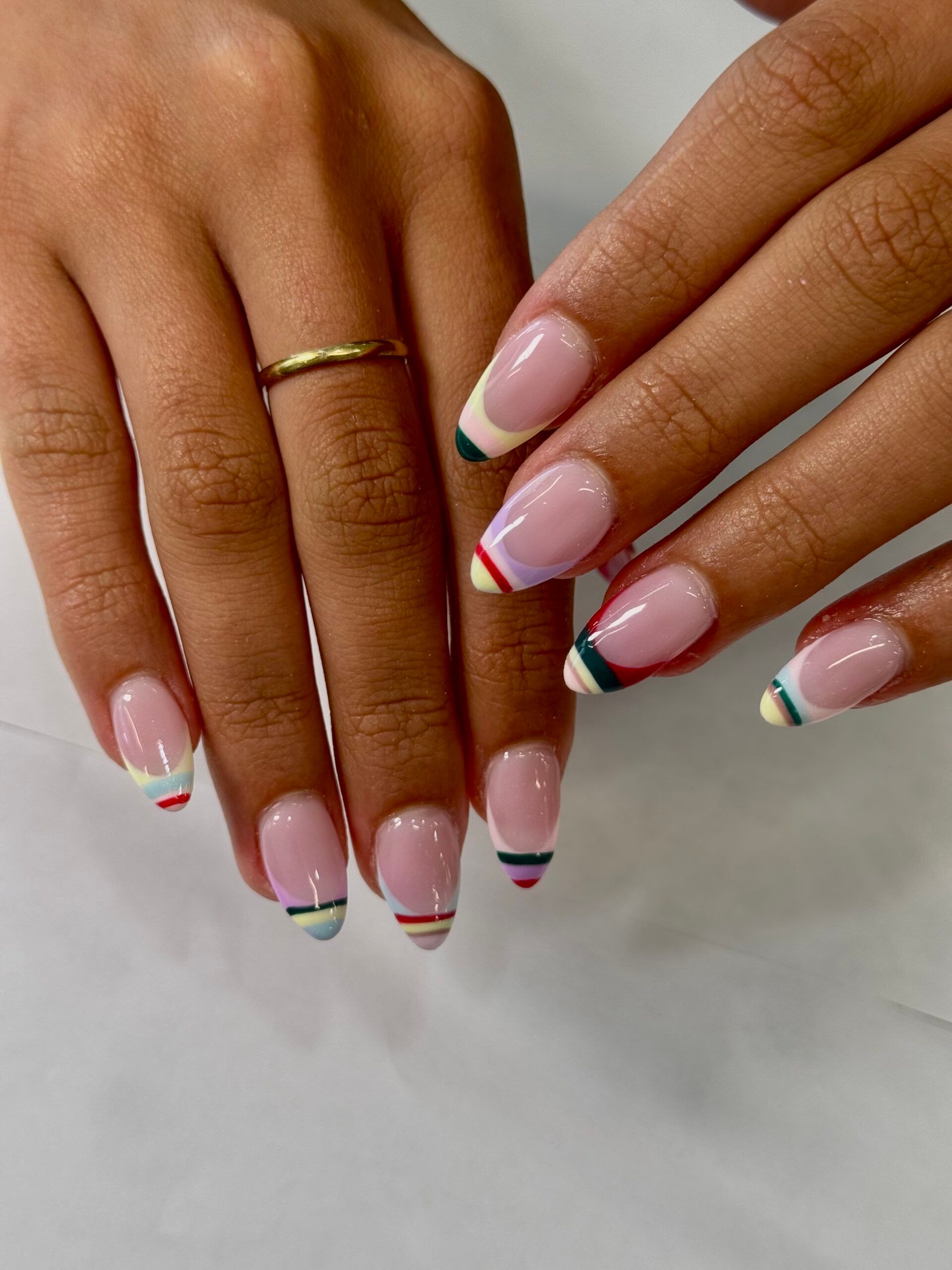 Almond nails with multicolor French tips